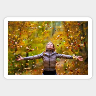 Young lady throwing up leaves Sticker